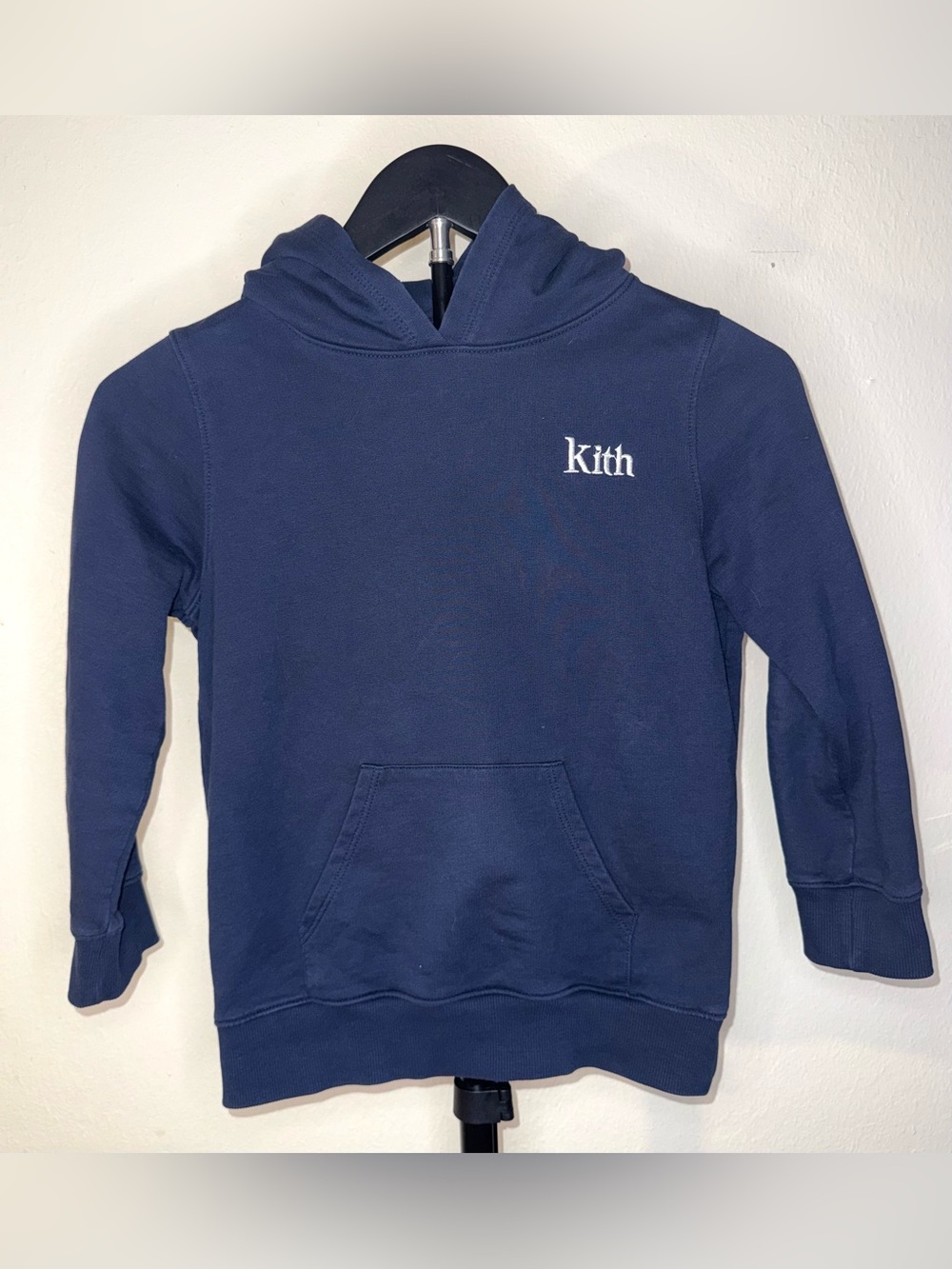 Kith blue Kids Williams Hoodie featuring a small white serif Kith logo, sz 6